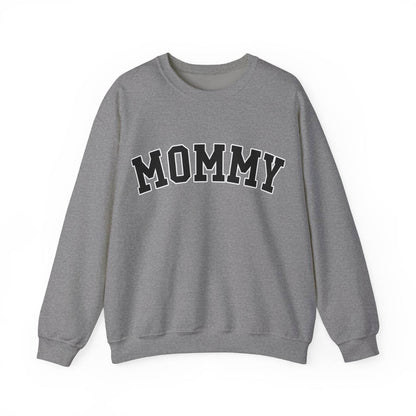 The perfect gift for mom. Our Mother’s Day special. Our crewneck sweatshirt. The color of the shirt is graphite heater, and in big varsity letters it says MOMMY on the chest. It’s available in six sizes, ranging from S to 3XL. 
