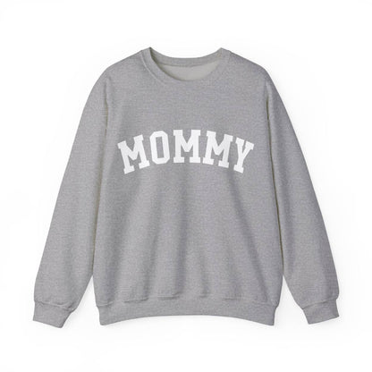 The perfect gift for mom. Our Mother’s Day special. Our crewneck sweatshirt. The color of the shirt is sport gray, and in big white varsity letters it says MOMMY on the chest. It’s available in six sizes, ranging from S to 3XL. 