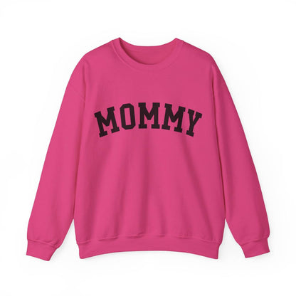 The perfect gift for mom. Our Mother’s Day special. Our crewneck sweatshirt. The color of the shirt is hot pink, and in big black varsity letters it says MOMMY on the chest. It’s available in six sizes, ranging from S to 3XL. 