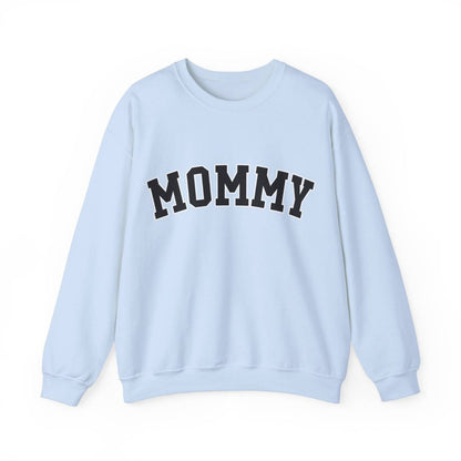 The perfect gift for mom. Our Mother’s Day special. Our crewneck sweatshirt. The color of the shirt is light blue, and in big varsity letters it says MOMMY on the chest. It’s available in six sizes, ranging from S to 3XL. 