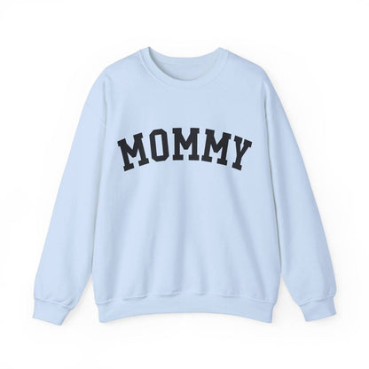 The perfect gift for mom. Our Mother’s Day special. Our crewneck sweatshirt. The color of the shirt is light blue, and in big black varsity letters it says MOMMY on the chest. It’s available in six sizes, ranging from S to 3XL. 