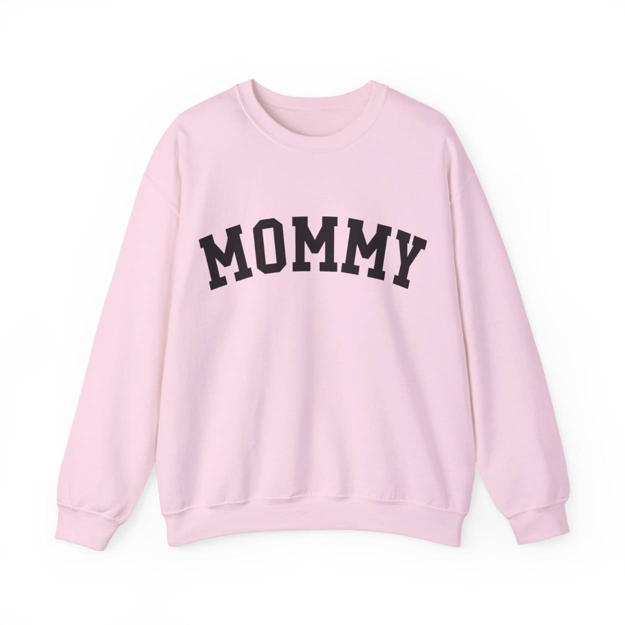 The perfect gift for mom. Our Mother’s Day special. Our crewneck sweatshirt. The color of the shirt is light pink, and in big black varsity letters it says MOMMY on the chest. It’s available in six sizes, ranging from S to 3XL. 