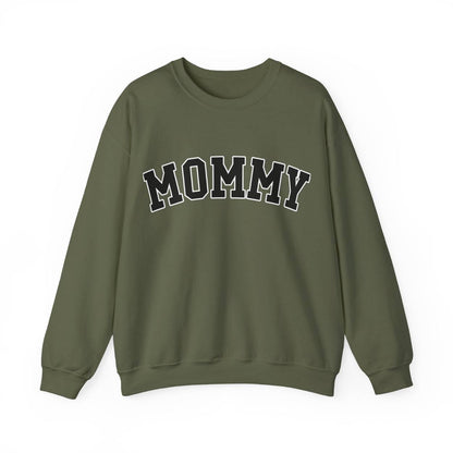 The perfect gift for mom. Our Mother’s Day special. Our crewneck sweatshirt. The color of the shirt is military green, and in big varsity letters it says MOMMY on the chest. It’s available in six sizes, ranging from S to 3XL. 