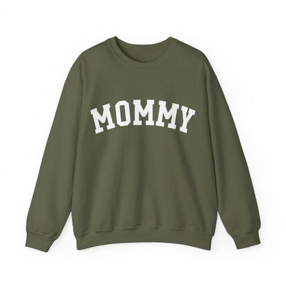 The perfect gift for mom. Our Mother’s Day special. Our crewneck sweatshirt. The color of the shirt is military green, and in big white varsity letters it says MOMMY on the chest. It’s available in six sizes, ranging from S to 3XL. 