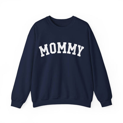 The perfect gift for mom. Our Mother’s Day special. Our crewneck sweatshirt. The color of the shirt is navy blue, and in big white varsity letters it says MOMMY on the chest. It’s available in six sizes, ranging from S to 3XL. 