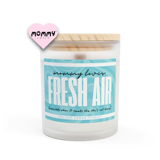 The perfect gift for mom, especially for mother's day. A frosted glass scented candle, with a wooden lid. The glass vessel is 11 oz, and the wax is 9oz. Burning time is around 50 hours. The label is beautifully designed in light blue colors, and it says: Mommy Loves Fresh Air. Underneath, in between brackets it says: especially when it smells like she's not home. A funny, yet original gift for mom! The scent is balsam cedar forest. Super relaxing.
