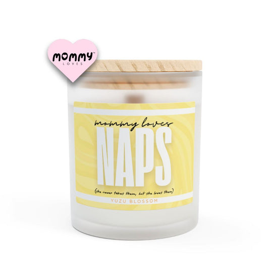 The perfect gift for mom, especially for mother's day. A frosted glass scented candle, with a wooden lid. The glass vessel is 11 oz, and the wax is 9oz. Burning time is around 50 hours. The label is beautifully designed in light yellow colors, and it says: Mommy Loves Naps. Underneath, in between brackets it says: she never takes them, but she loves them. A funny, yet original gift for mom! The fragrance is yuzu blossom. Super relaxing.